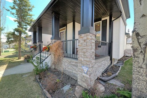111 West Springs Way Sw, Calgary, AB - Outdoor With Deck Patio Veranda