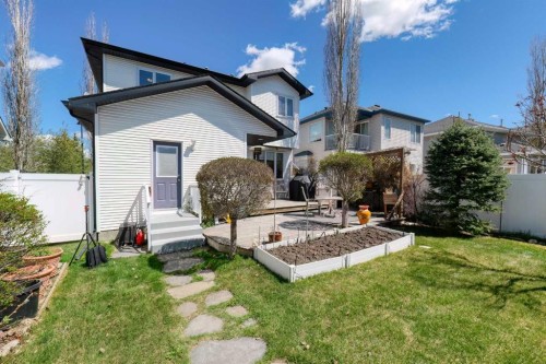 111 West Springs Way Sw, Calgary, AB - Outdoor With Deck Patio Veranda