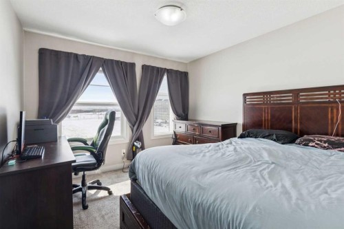 116 Seton Passage Se, Calgary, AB - Indoor Photo Showing Bedroom