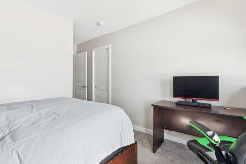 116 Seton Passage Se, Calgary, AB - Indoor Photo Showing Bedroom