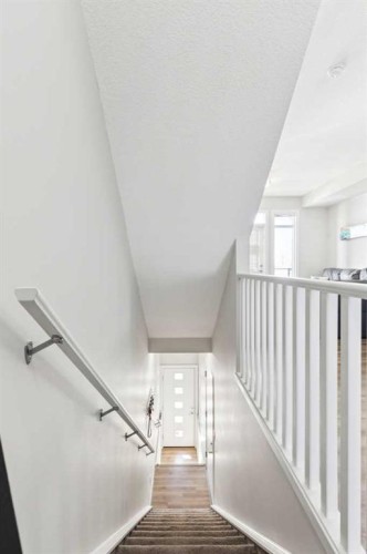 116 Seton Passage Se, Calgary, AB - Indoor Photo Showing Other Room