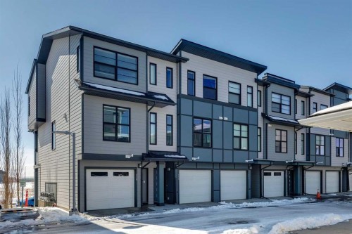 116 Seton Passage Se, Calgary, AB - Outdoor With Facade