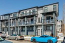 116 Seton Passage Se, Calgary, AB  - Outdoor With Balcony With Facade 