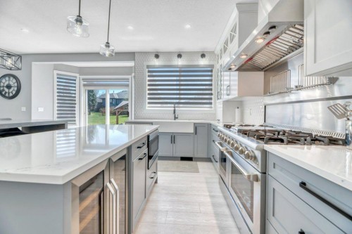 712 East Chestermere Drive, Chestermere, AB - Indoor Photo Showing Kitchen With Upgraded Kitchen