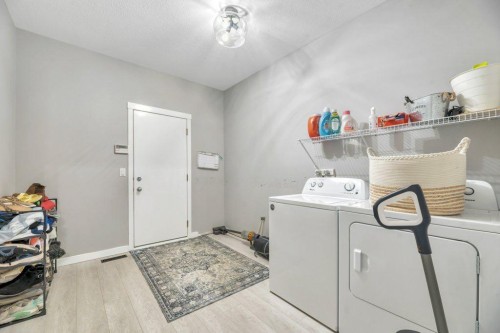 712 East Chestermere Drive, Chestermere, AB - Indoor Photo Showing Laundry Room