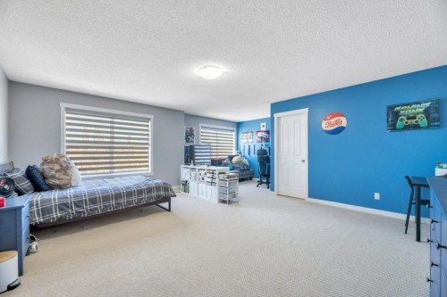 712 East Chestermere Drive, Chestermere, AB - Indoor Photo Showing Bedroom
