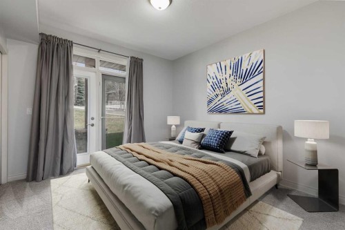 7-181 Rockyledge View Nw, Calgary, AB - Indoor Photo Showing Bedroom