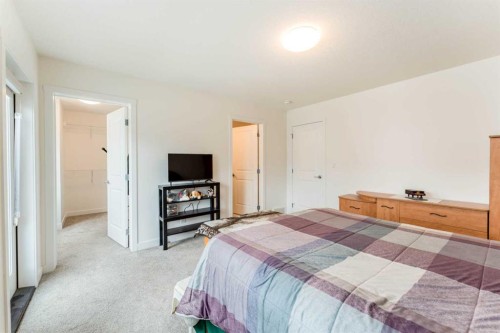 317 Baneberry Way Sw, Airdrie, AB - Indoor Photo Showing Bedroom