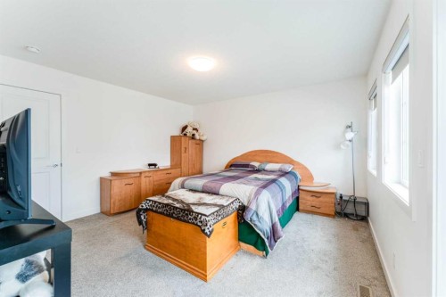 317 Baneberry Way Sw, Airdrie, AB - Indoor Photo Showing Bedroom
