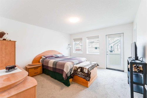 317 Baneberry Way Sw, Airdrie, AB - Indoor Photo Showing Bedroom