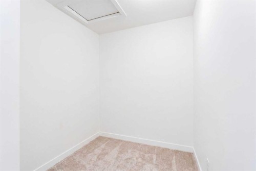 317 Baneberry Way Sw, Airdrie, AB - Indoor Photo Showing Other Room