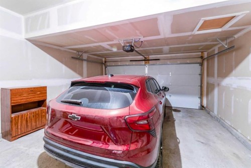 317 Baneberry Way Sw, Airdrie, AB - Indoor Photo Showing Garage