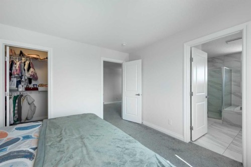 107 Dawson Harbour Court, Chestermere, AB - Indoor Photo Showing Bedroom