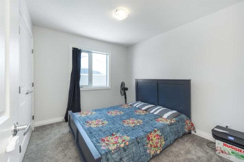 107 Dawson Harbour Court, Chestermere, AB - Indoor Photo Showing Bedroom