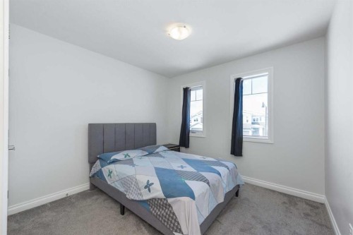 107 Dawson Harbour Court, Chestermere, AB - Indoor Photo Showing Bedroom