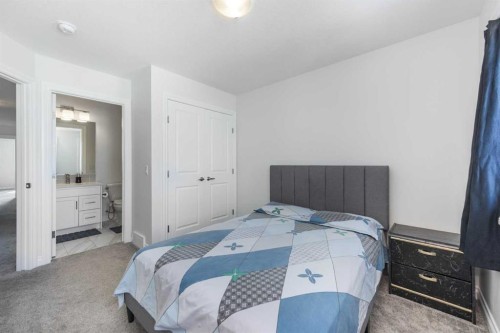 107 Dawson Harbour Court, Chestermere, AB - Indoor Photo Showing Bedroom