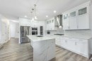 107 Dawson Harbour Court, Chestermere, AB  - Indoor Photo Showing Kitchen With Stainless Steel Kitchen With Upgraded Kitchen 