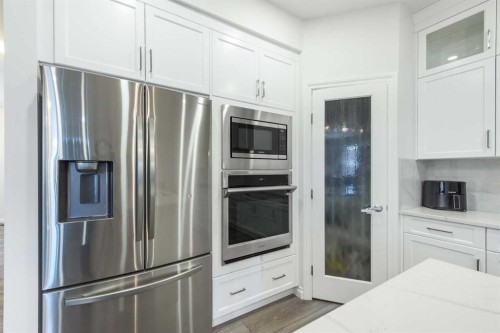 107 Dawson Harbour Court, Chestermere, AB - Indoor Photo Showing Kitchen With Stainless Steel Kitchen