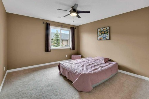 305-413 River Avenue, Cochrane, AB - Indoor Photo Showing Bedroom