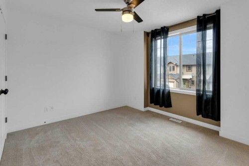 305-413 River Avenue, Cochrane, AB - Indoor Photo Showing Other Room