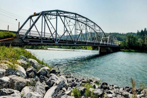 305-413 River Avenue, Cochrane, AB - Outdoor With Body Of Water