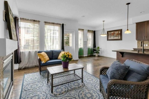 305-413 River Avenue, Cochrane, AB - Indoor Photo Showing Living Room