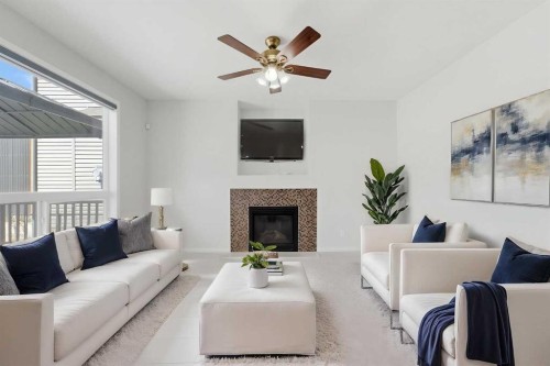 42 Skyview Point Rise Ne, Calgary, AB - Indoor Photo Showing Living Room With Fireplace