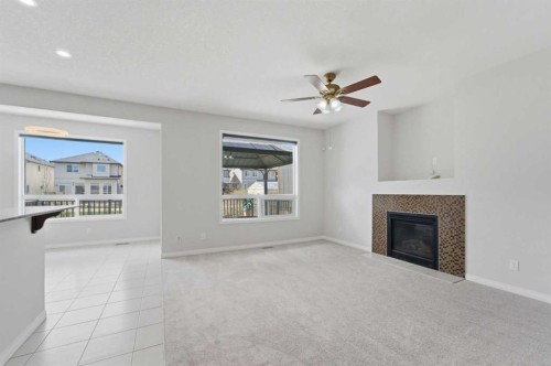 42 Skyview Point Rise Ne, Calgary, AB - Indoor Photo Showing Living Room With Fireplace