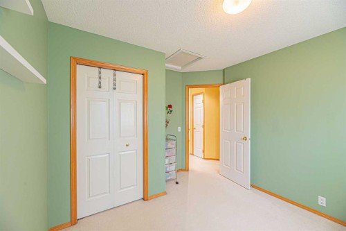 18 Coral Springs Circle Ne, Calgary, AB - Indoor Photo Showing Other Room