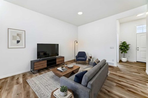 36 Mercado Road Se, Calgary, AB - Indoor Photo Showing Living Room