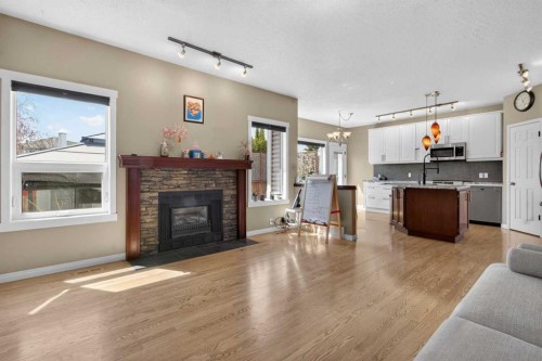 20 Riverwood Crescent Se, Calgary, AB - Indoor With Fireplace