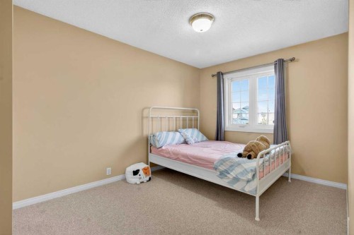 20 Riverwood Crescent Se, Calgary, AB - Indoor Photo Showing Bedroom