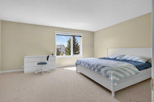 20 Riverwood Crescent Se, Calgary, AB - Indoor Photo Showing Bedroom