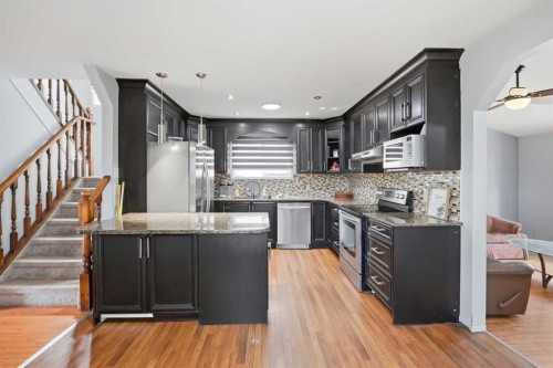 65 Falmere Way Ne, Calgary, AB - Indoor Photo Showing Kitchen With Upgraded Kitchen