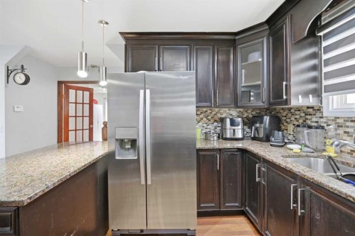 65 Falmere Way Ne, Calgary, AB - Indoor Photo Showing Kitchen With Upgraded Kitchen