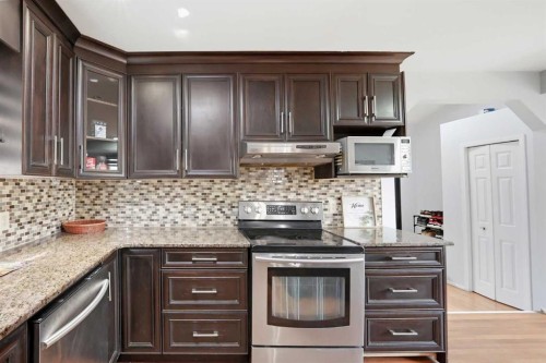65 Falmere Way Ne, Calgary, AB - Indoor Photo Showing Kitchen With Upgraded Kitchen