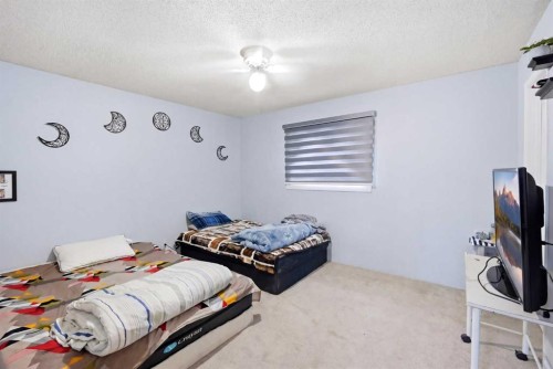 65 Falmere Way Ne, Calgary, AB - Indoor Photo Showing Bedroom