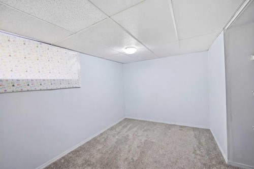 65 Falmere Way Ne, Calgary, AB - Indoor Photo Showing Other Room