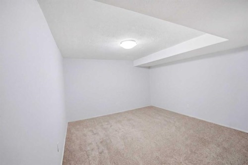 65 Falmere Way Ne, Calgary, AB - Indoor Photo Showing Other Room