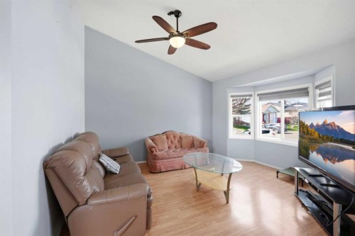 65 Falmere Way Ne, Calgary, AB - Indoor Photo Showing Living Room
