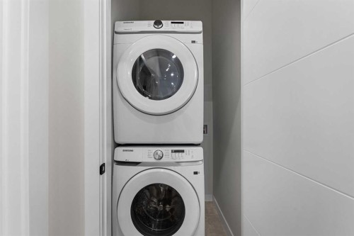 19 Wolf Crescent, Okotoks, AB - Indoor Photo Showing Laundry Room