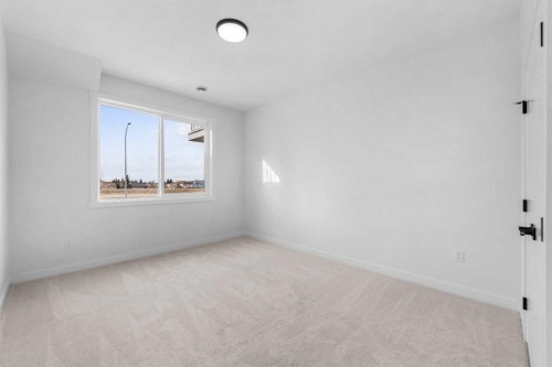 19 Wolf Crescent, Okotoks, AB - Indoor Photo Showing Other Room