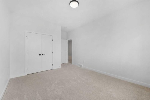 19 Wolf Crescent, Okotoks, AB - Indoor Photo Showing Other Room