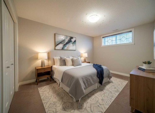 107 Panatella Close Nw, Calgary, AB - Indoor Photo Showing Bedroom