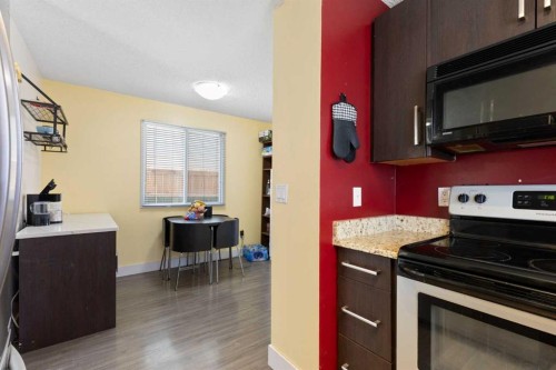 21 Mckernan Road Se, Calgary, AB - Indoor Photo Showing Kitchen