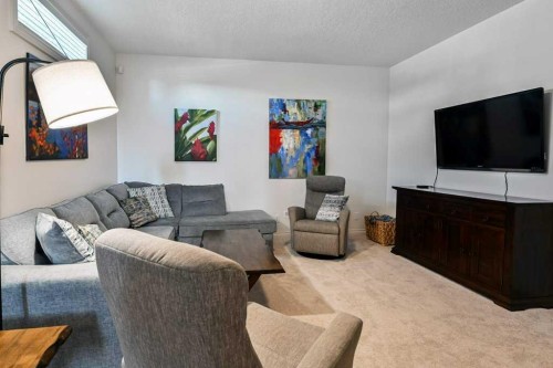56 Discovery Woods Villas Sw, Calgary, AB - Indoor Photo Showing Living Room
