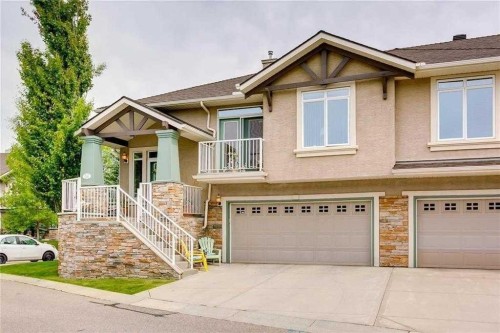 56 Discovery Woods Villas Sw, Calgary, AB - Outdoor With Facade