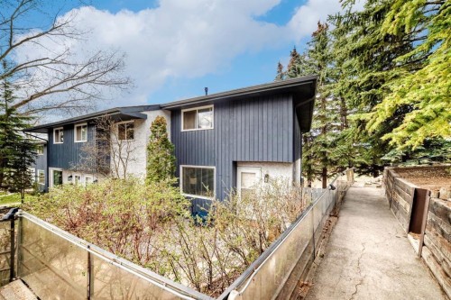 11-800 Bowcroft Place, Cochrane, AB - Outdoor