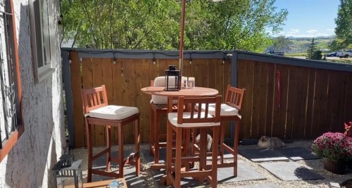 11-800 Bowcroft Place, Cochrane, AB - Outdoor