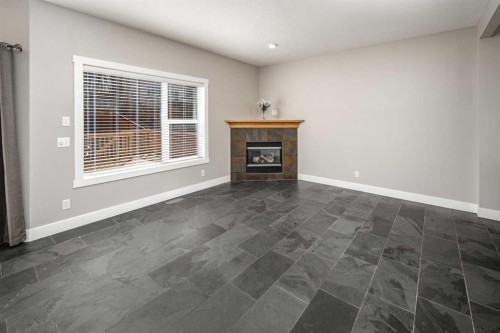10514 Rockyledge Street Nw, Calgary, AB - Indoor With Fireplace